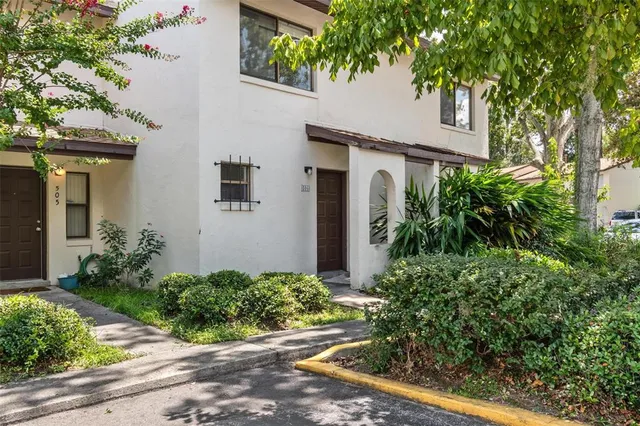 a kitchen with stainless steel appliances granite countertop a sink and dishwasher with cabinets