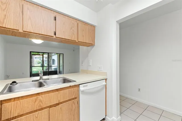 a view of a bird house next to a yard