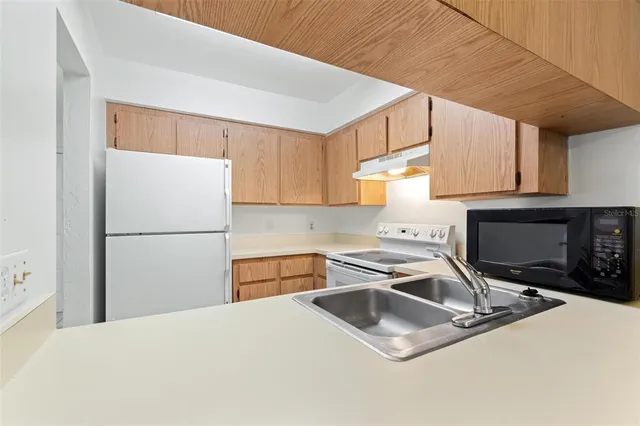 a view of a glass door and an empty room