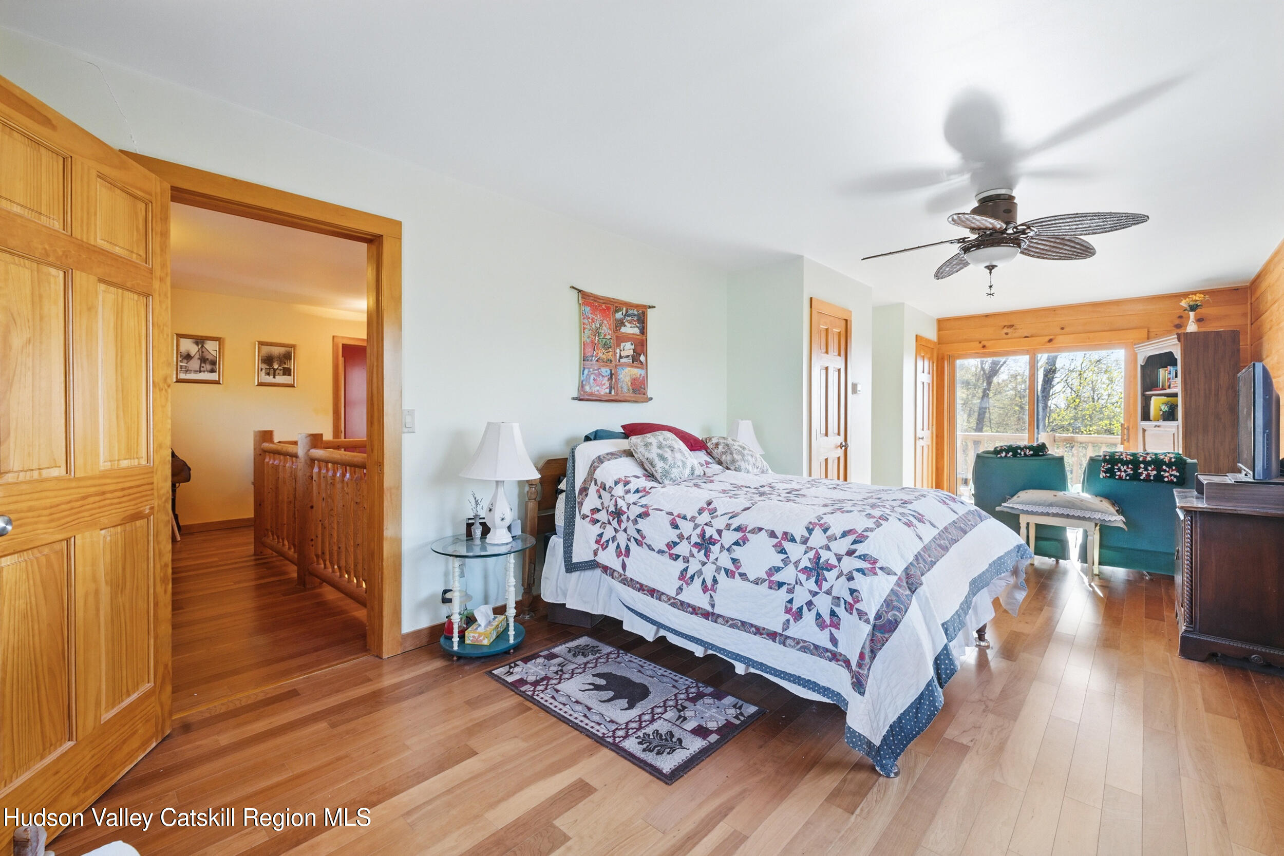 48 Hillside Drive West Shokan, NY 12494 - Photo 11 of 30 a bedroom with a bed and a table