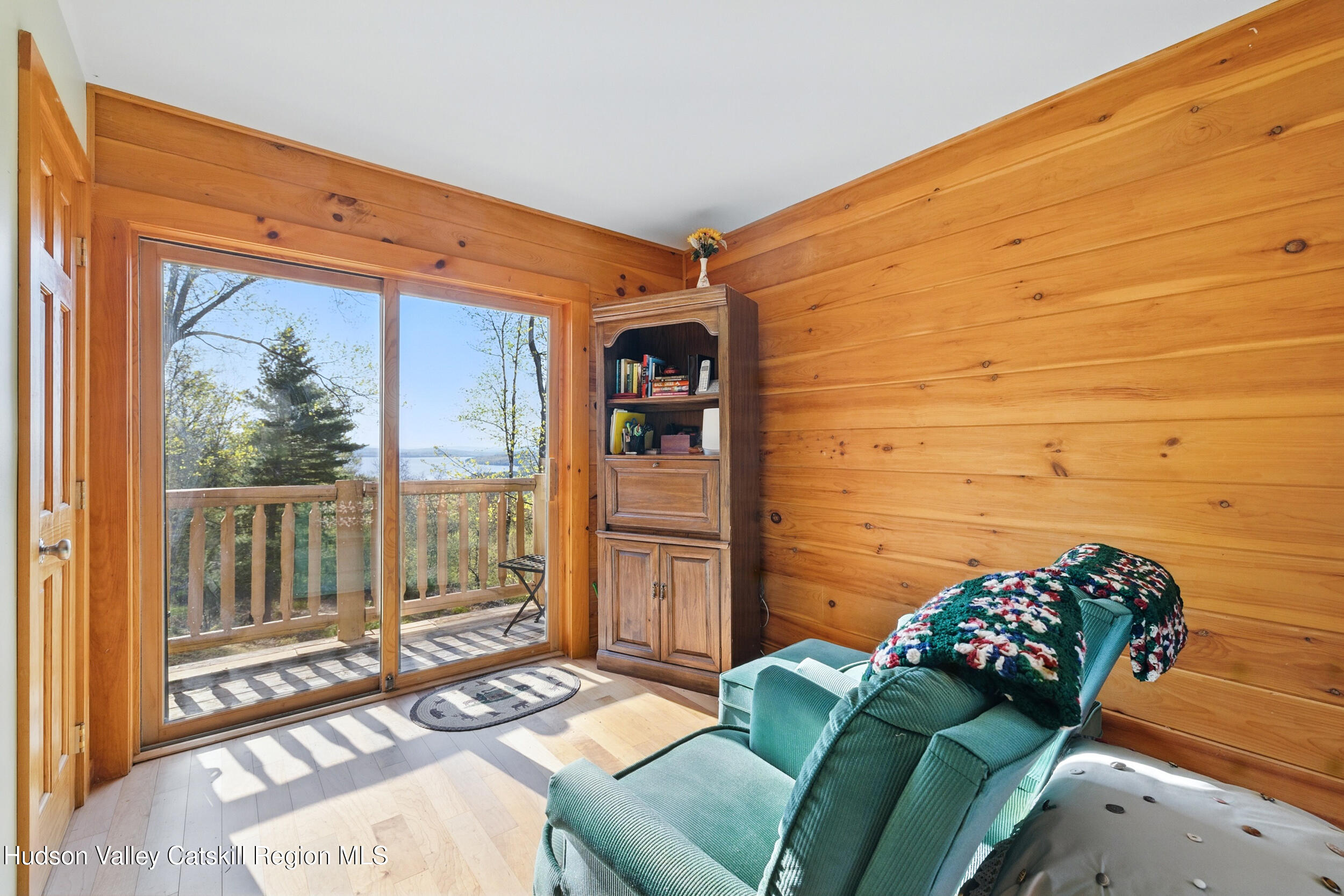 48 Hillside Drive West Shokan, NY 12494 - Photo 12 of 30 a living room with furniture and a floor to ceiling window