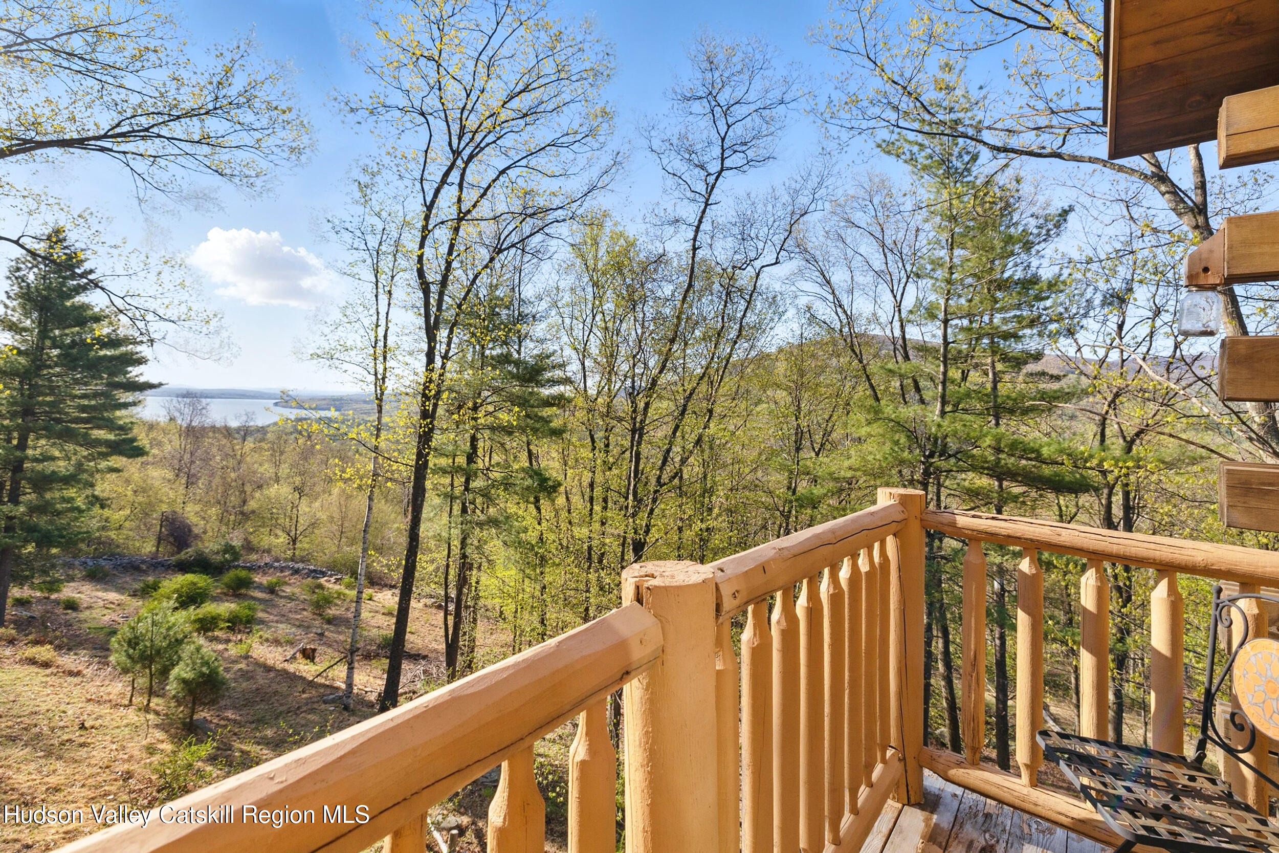 48 Hillside Drive West Shokan, NY 12494 - Photo 13 of 30 a view of a balcony with wooden fence and floor
