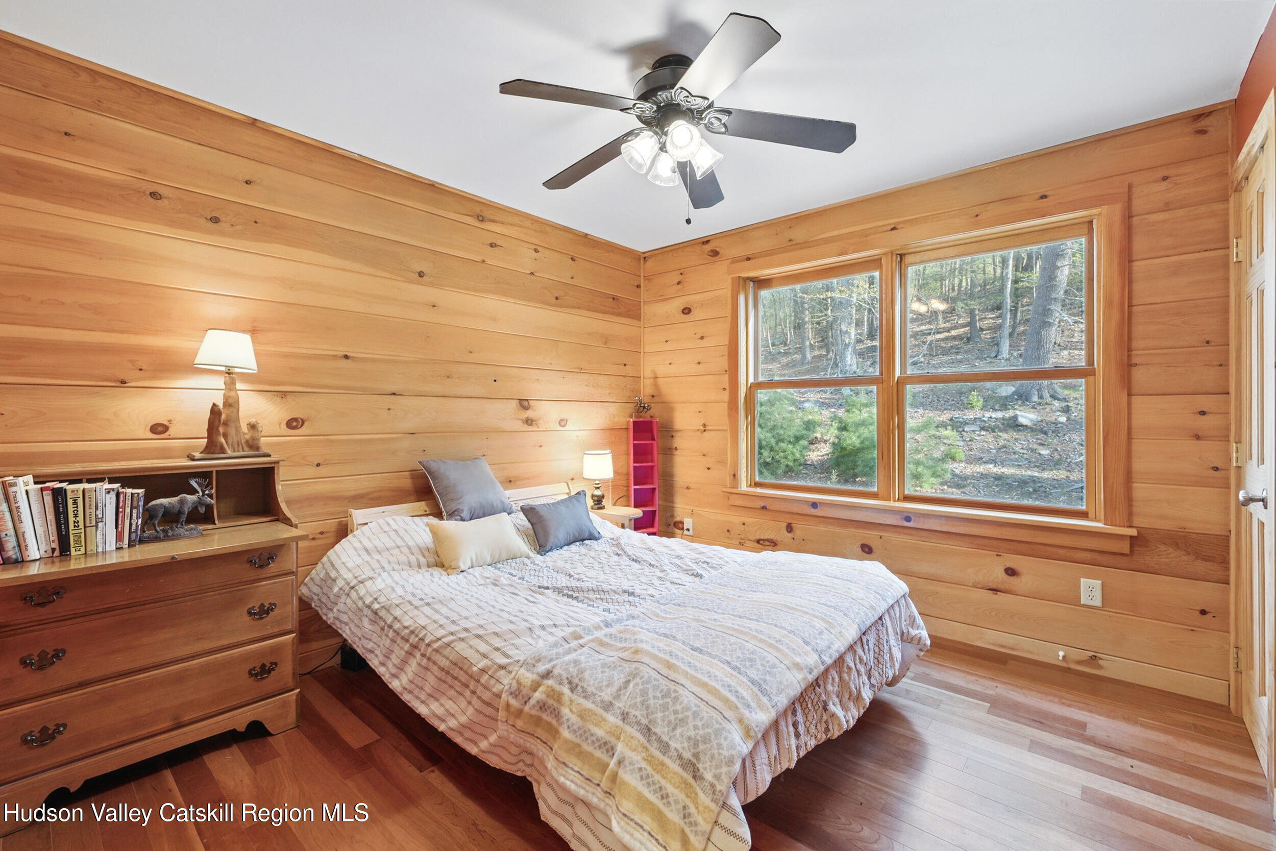 48 Hillside Drive West Shokan, NY 12494 - Photo 16 of 30 a bedroom with a bed and a large window with the outer view