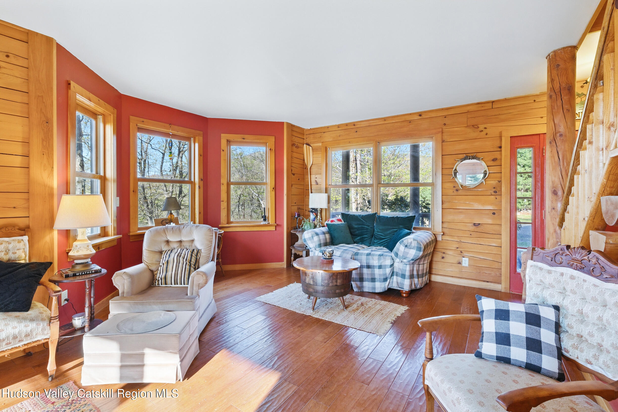 48 Hillside Drive West Shokan, NY 12494 - Photo 17 of 30 a living room with furniture and floor to ceiling windows