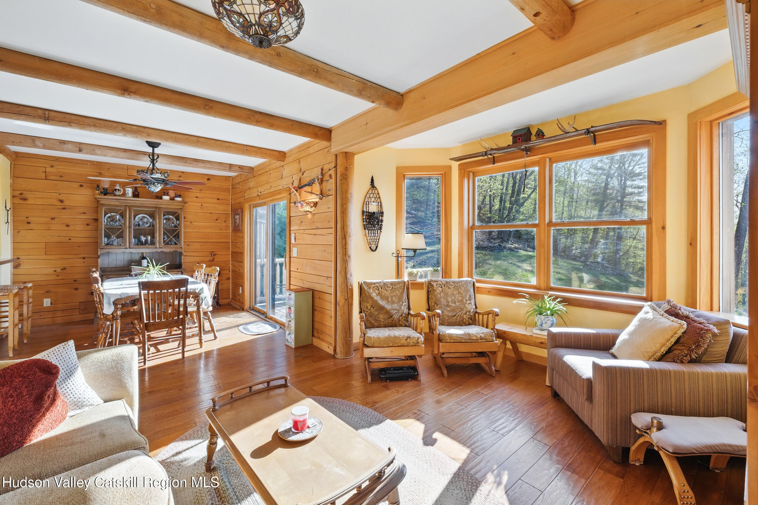48 Hillside Drive West Shokan, NY 12494 - Photo 6 of 30 a living room with furniture and a large window