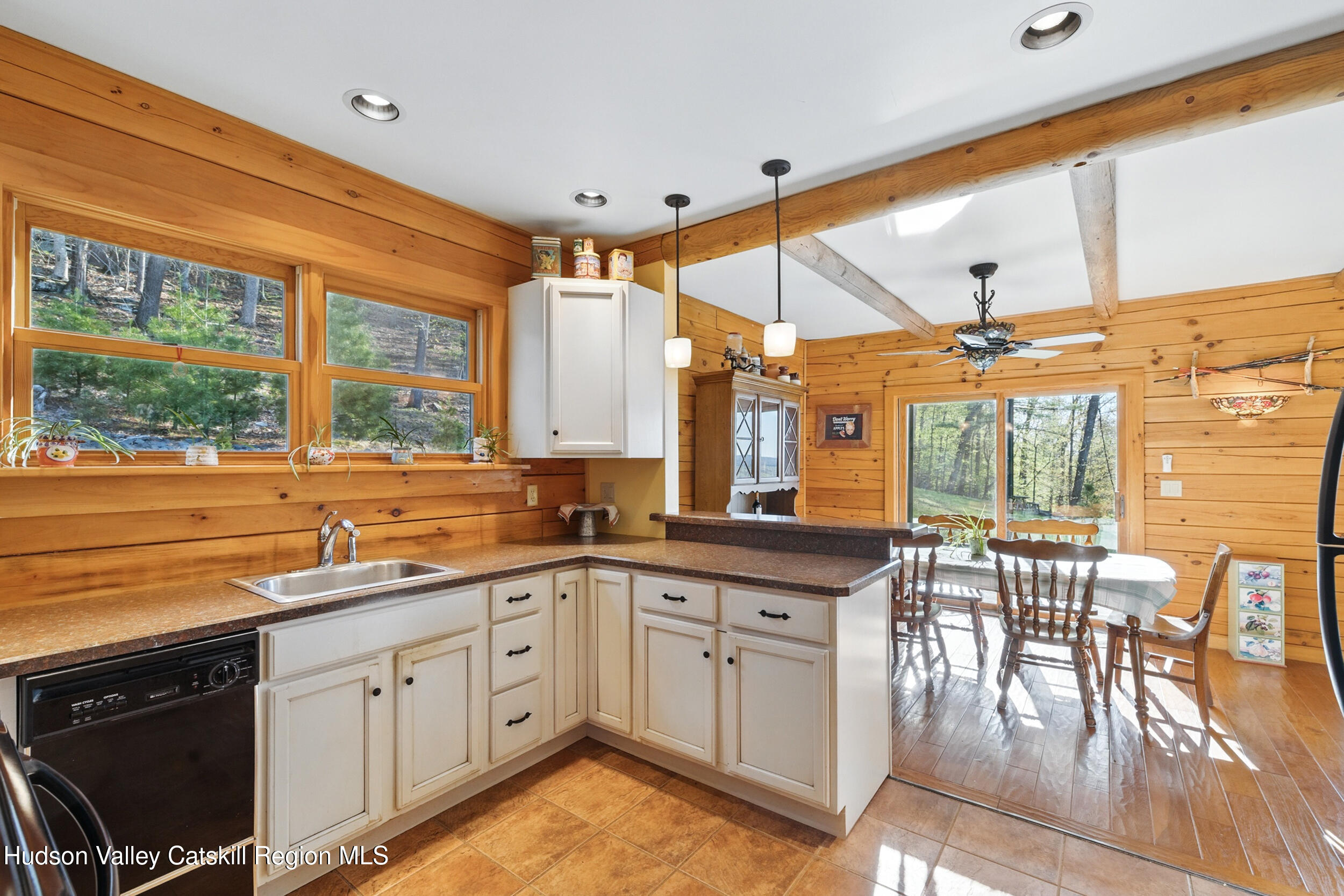 48 Hillside Drive West Shokan, NY 12494 - Photo 8 of 30 a kitchen with a sink stove and cabinets