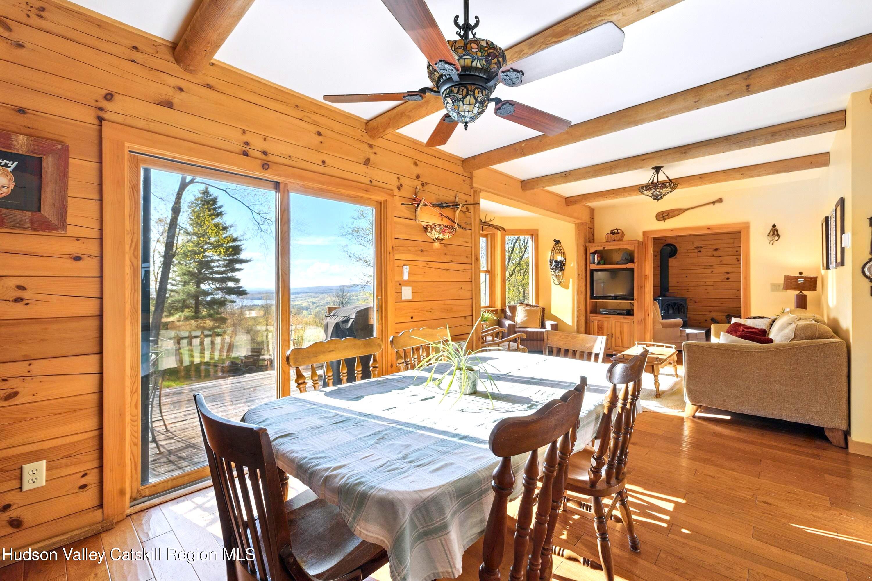 48 Hillside Drive West Shokan, NY 12494 - Photo 9 of 30 a view of a dining room with furniture window and wooden floor