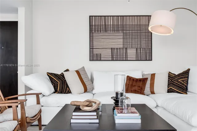 a room with a table and chairs