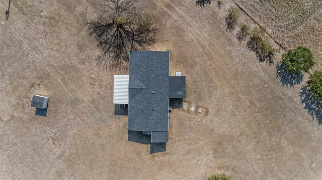 a kitchen with a sink and a refrigerator
