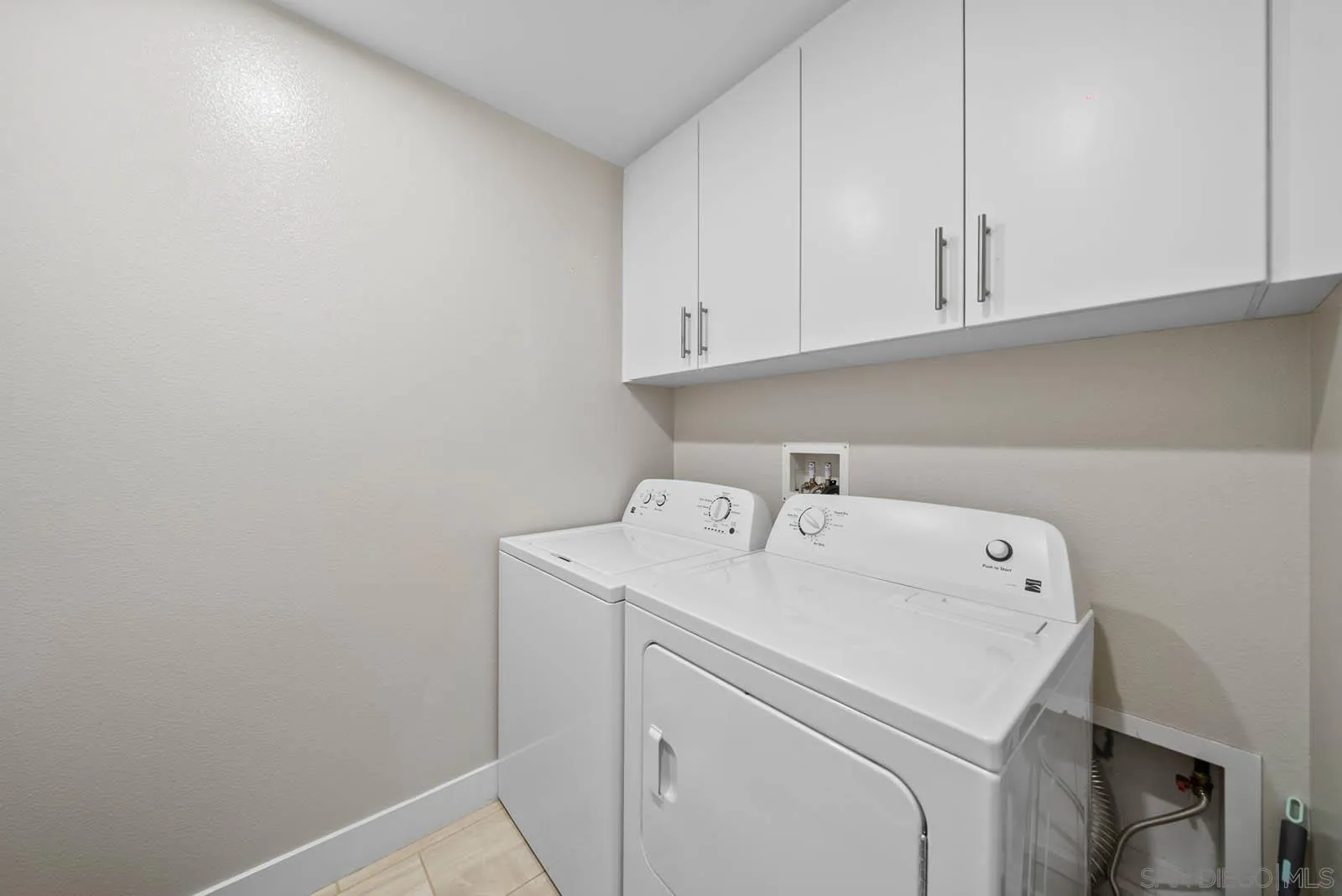 612 Rockefeller Irvine, CA 92612 - Photo 11 of 49 a utility room with dryer and washer