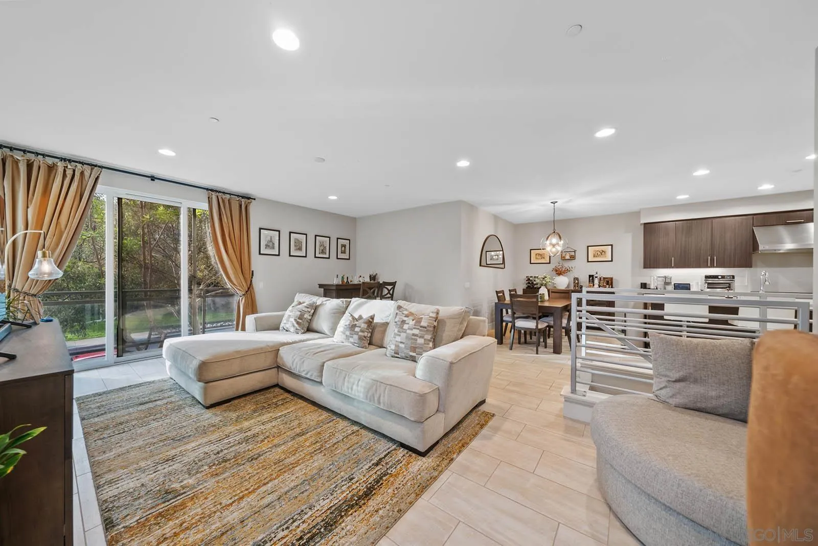 612 Rockefeller Irvine, CA 92612 - Photo 14 of 49 a living room with furniture wooden floor and a large window