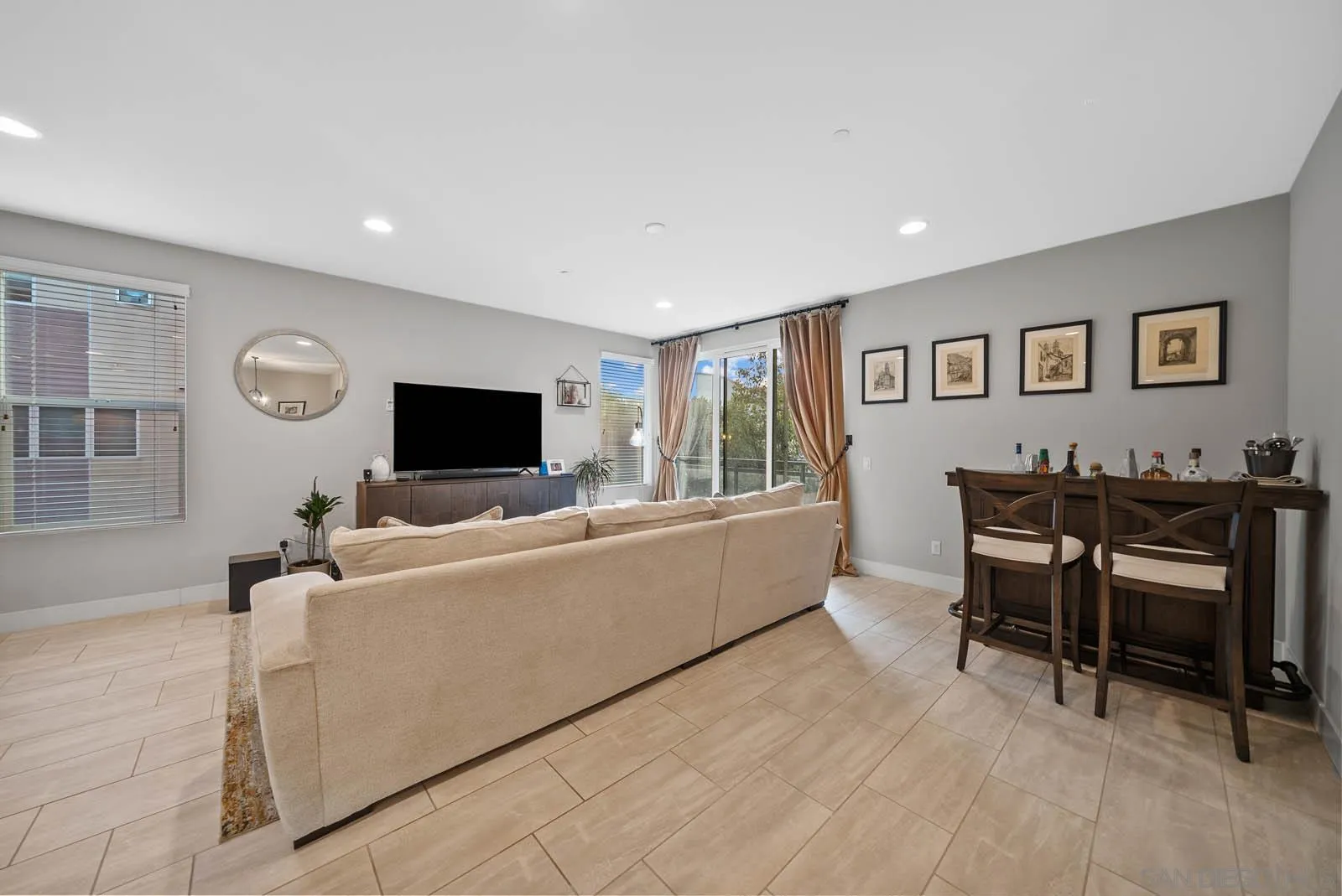 612 Rockefeller Irvine, CA 92612 - Photo 17 of 49 a living room with furniture and a flat screen tv