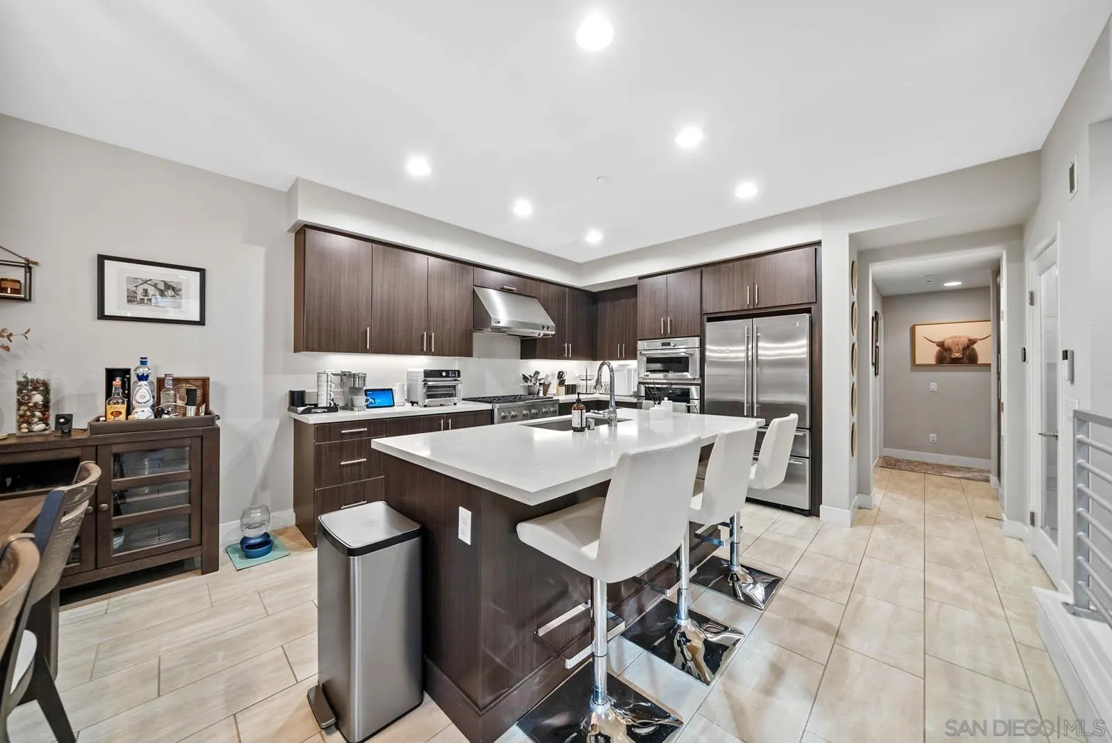 612 Rockefeller Irvine, CA 92612 - Photo 23 of 49 a kitchen with kitchen island a sink stove and refrigerator