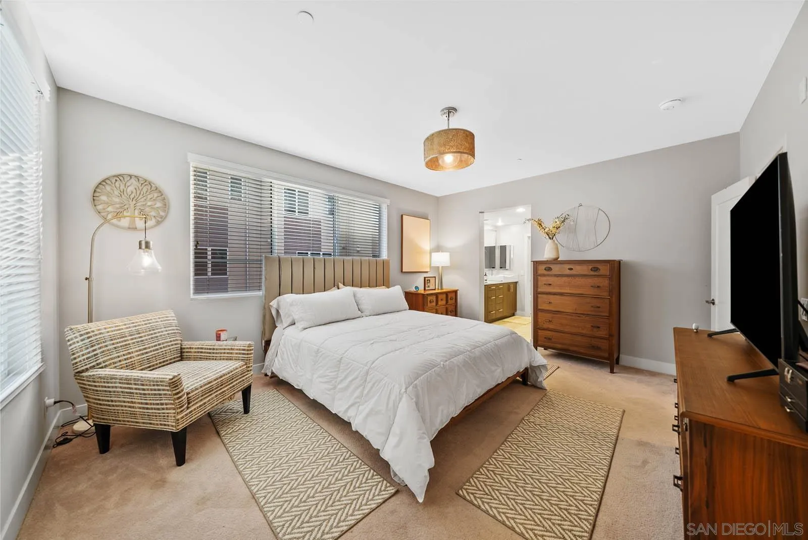 612 Rockefeller Irvine, CA 92612 - Photo 33 of 49 a bedroom with a bed and a television