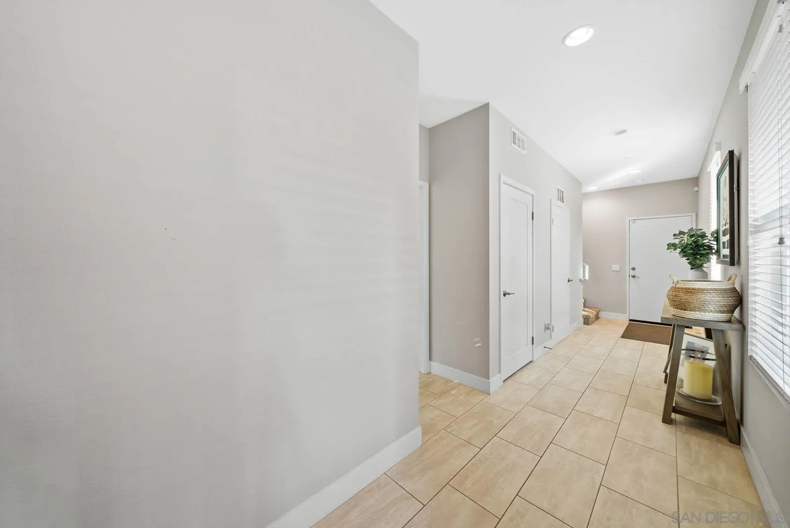 612 Rockefeller Irvine, CA 92612 - Photo 6 of 49 a view of a livingroom with a dinning table and chair