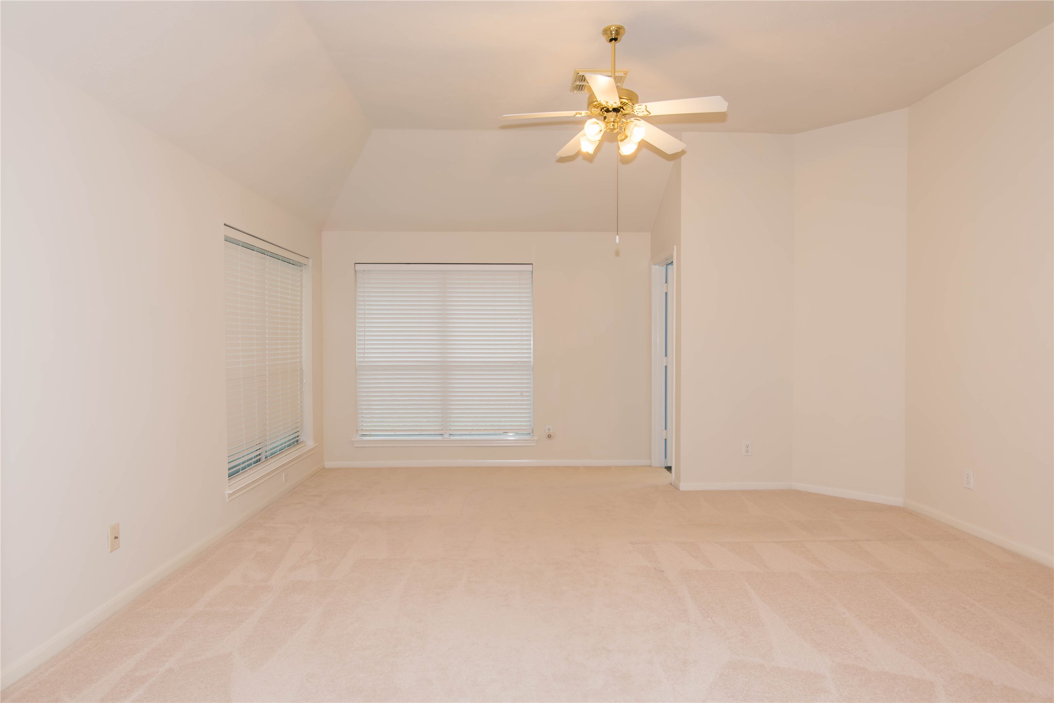 9115 Sunny Ridge Drive Houston, TX 77095 - Photo 16 of 20 an empty room with chandelier fan