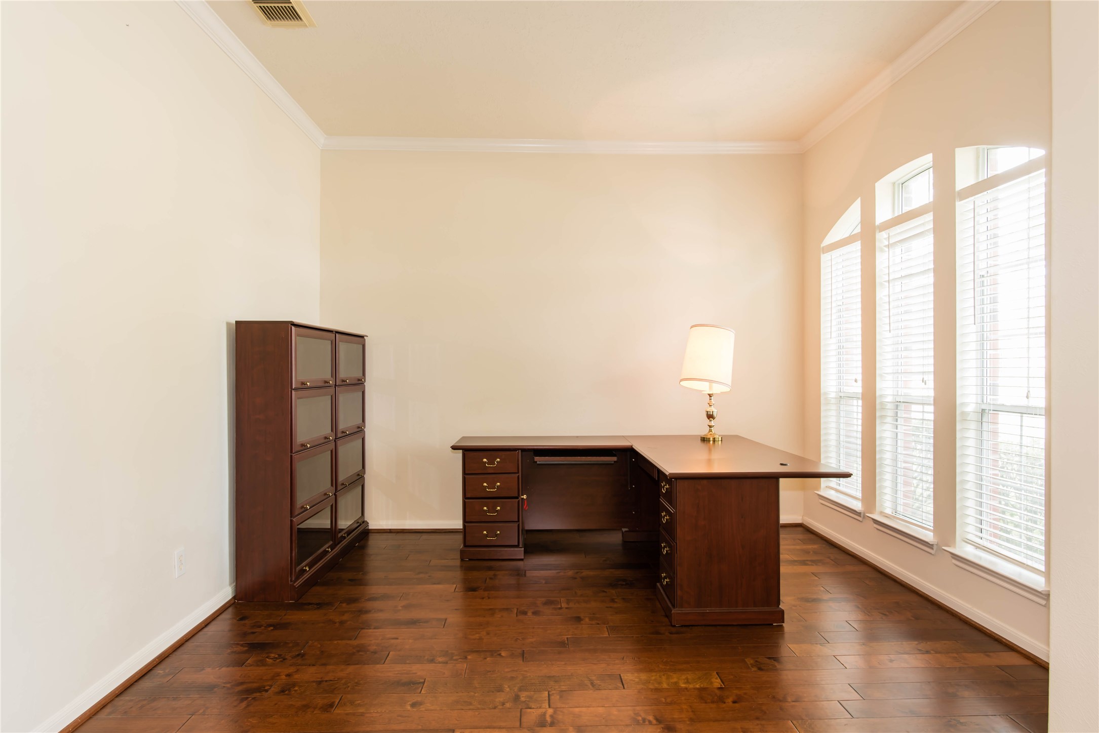 9115 Sunny Ridge Drive Houston, TX 77095 - Photo 2 of 20 a view of a livingroom with wooden floor and a staircase