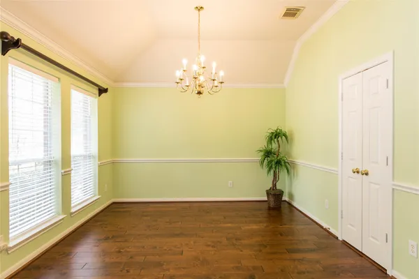 a view of a room with a large window