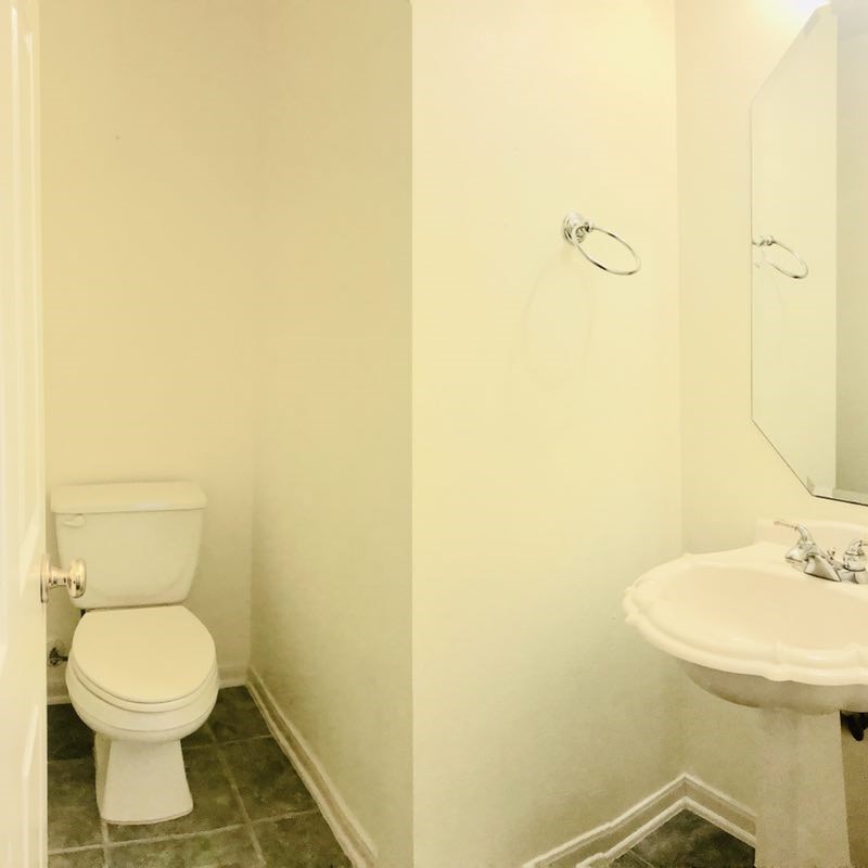9115 Sunny Ridge Drive Houston, TX 77095 - Photo 4 of 20 a bathroom with a sink and a toilet