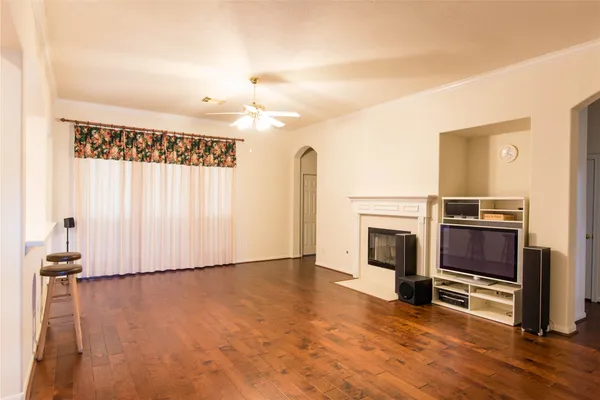 a view of a livingroom with furniture and a fireplace