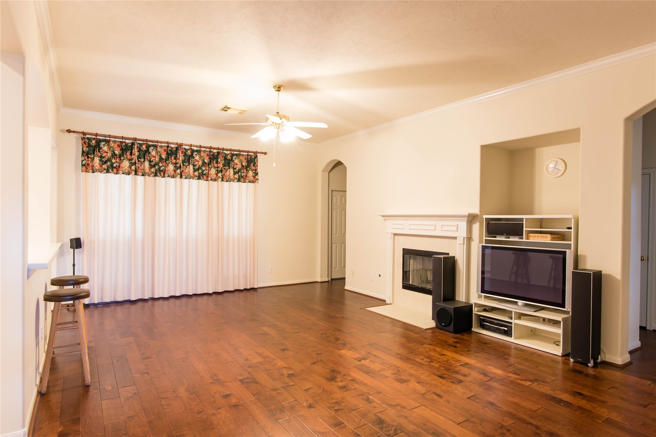 9115 Sunny Ridge Drive Houston, TX 77095 - Photo 6 of 20 a view of a livingroom with furniture and a fireplace