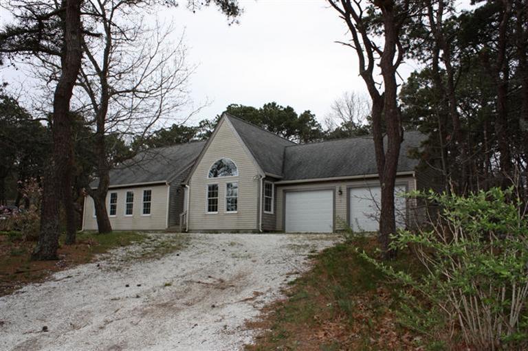 7 Pine Ridge Road Truro, MA 02666 - Photo 2 of 12 front view of house with a yard