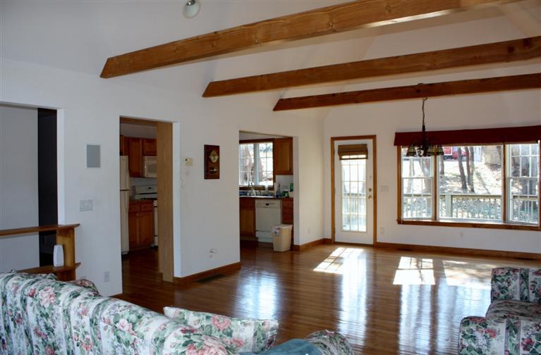 7 Pine Ridge Road Truro, MA 02666 - Photo 3 of 12 a bedroom with furniture and a large window