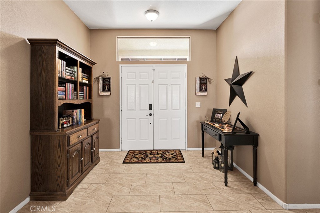 20403 Ochoa Road Apple Valley, CA 92307 - Photo 13 of 48 a view of a livingroom with furniture and windows
