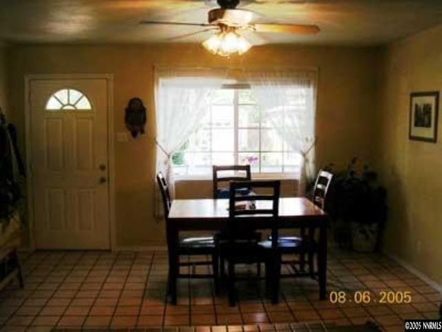 3395 Rauscher Drive Reno, NV 89503 - Photo 3 of 7 a view of a dining room with furniture and window