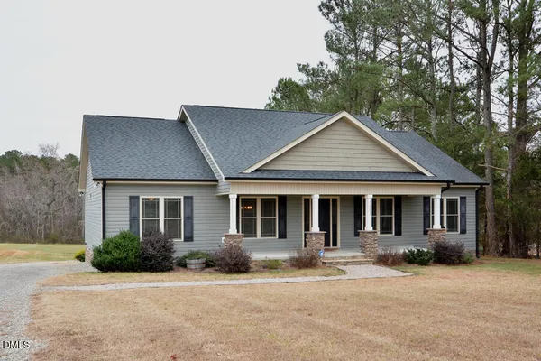 front view of a house with a patio