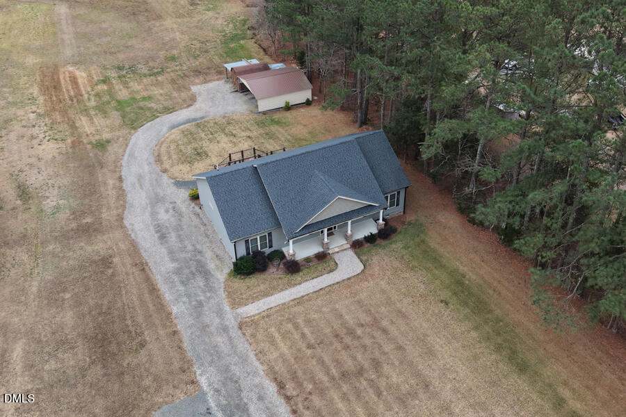 3082 East Thollie Green Road Stem, NC 27581 - Photo 2 of 45 view of a backyard with sitting area