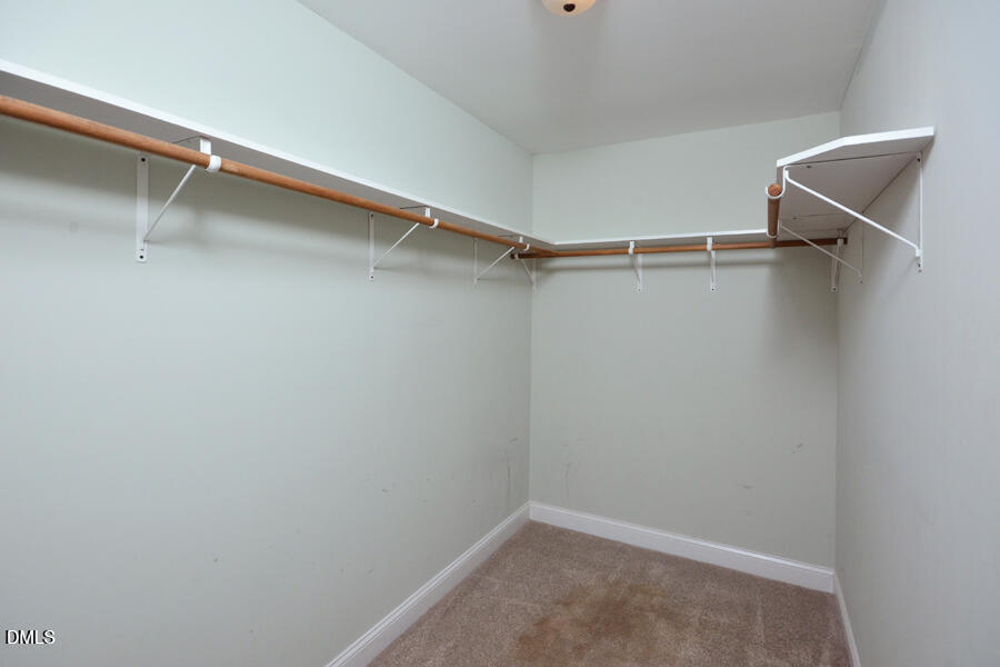 3082 East Thollie Green Road Stem, NC 27581 - Photo 26 of 45 a view of an empty walk in closet