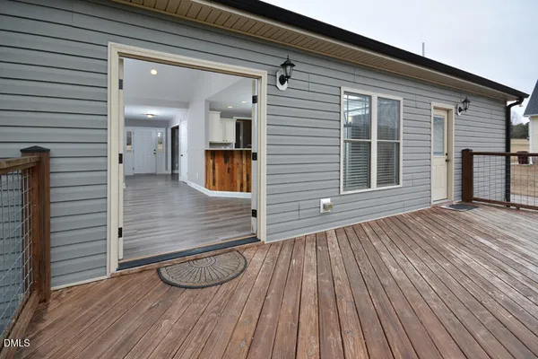 a front view of a house with patio
