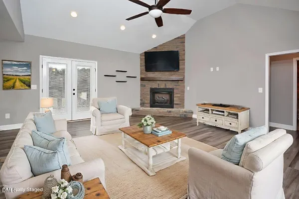 a view of a livingroom with a fireplace