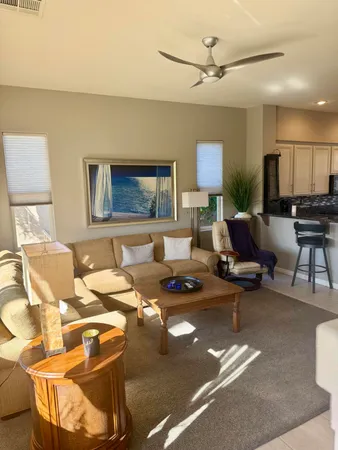 a bedroom with furniture and a flat screen tv
