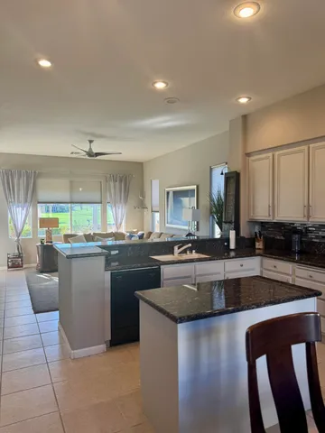 a kitchen with counter top space and appliances
