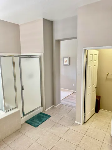 a view of entryway with bathroom