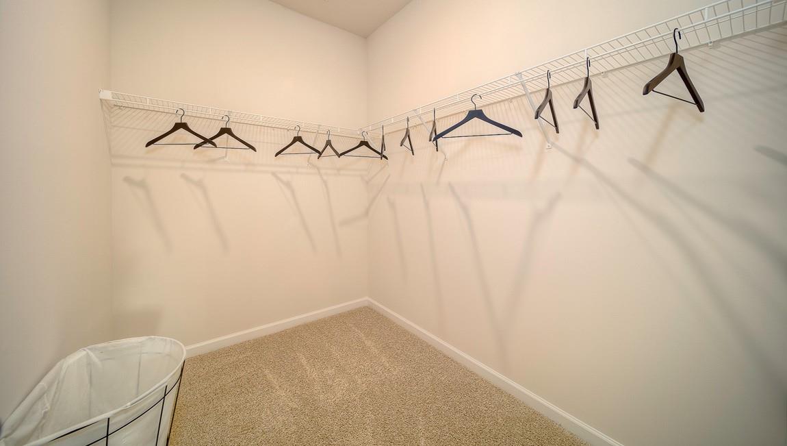 1240 Secrest Cmns Drive Monroe, NC 28112 - Photo 26 of 39 a view of a room with racks on the wall