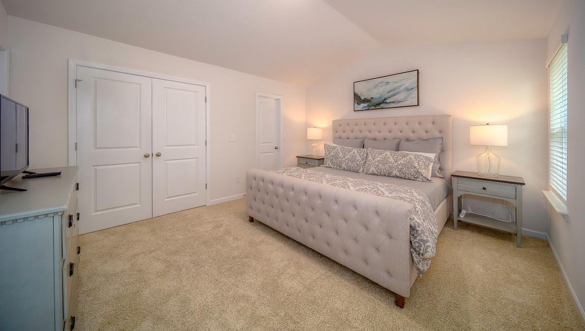 1240 Secrest Cmns Drive Monroe, NC 28112 - Photo 36 of 39 a bed room with a bed and a night stand