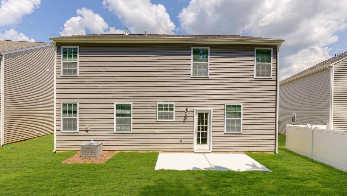 1240 Secrest Cmns Drive Monroe, NC 28112 - Photo 39 of 39 a front view of a house with a yard