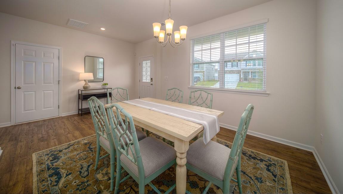 1240 Secrest Cmns Drive Monroe, NC 28112 - Photo 5 of 39 a view of a dining room with furniture and window