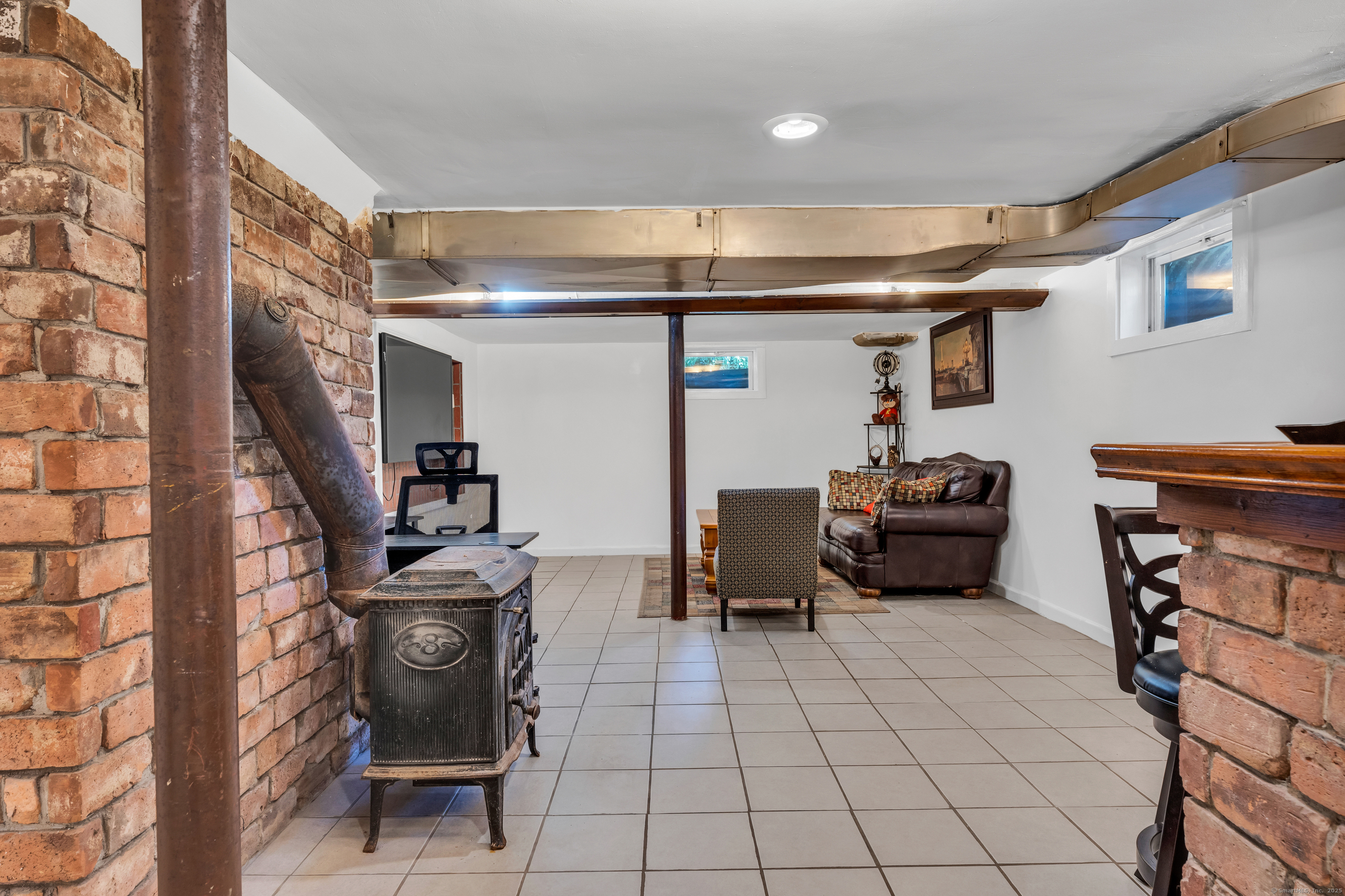 64 Dohm Avenue Guilford, CT 06437 - Photo 28 of 38 Partially finished basement