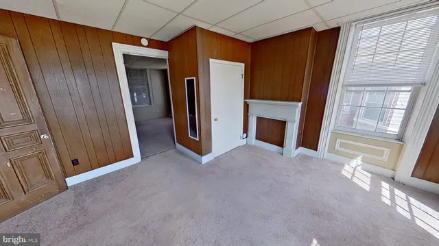 an empty room with windows