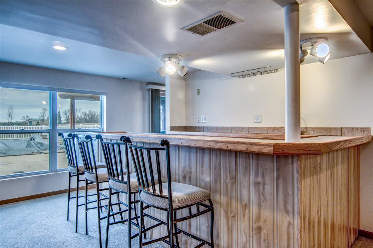9430 Edson Road Capron, IL 61012 - Photo 20 of 25 a view of a dining room with furniture window and wooden floor