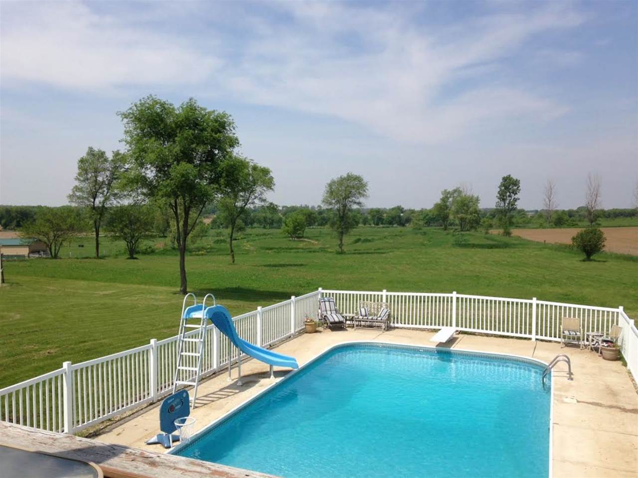 9430 Edson Road Capron, IL 61012 - Photo 21 of 25 a view of a garden with lake