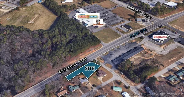 an aerial view of residential house with parking space