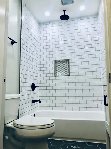 a bathroom with a sink and a bathtub