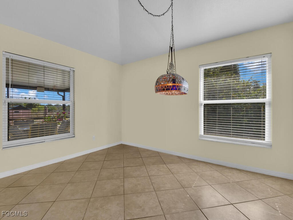4370 20th Street Northeast Naples, FL 34120 - Photo 12 of 35 a view of an empty room with a window