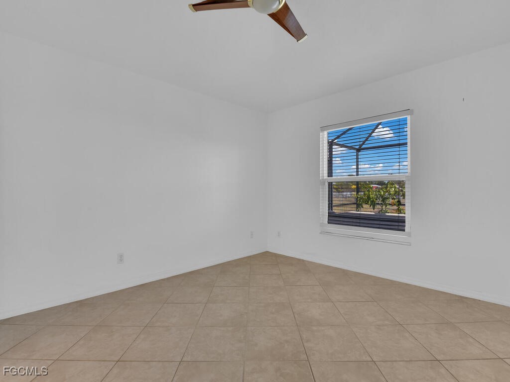 4370 20th Street Northeast Naples, FL 34120 - Photo 16 of 35 an empty room with a window