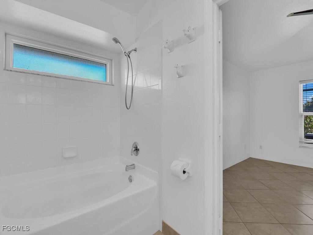 4370 20th Street Northeast Naples, FL 34120 - Photo 19 of 35 a bathroom with a bathtub